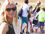 EXCLUSIVE TO INF.\nAugust 27, 2015: Gwyneth Paltrow spotted with her kids Apple and Moses as they leave the Hamptons on a private helicopter in East Hampton, NY.\nMandatory Credit: Matt Agudo/INFphoto.com Ref: infusny-251