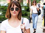 New York, NY - "Fifty Shades of Grey" star Dakota Johnson is casual cool as she is seen in New York City running errands on a warm cloudy day. Dakota wore a white fitted t-shirt tucked into a pair of cuffed denim jeans as she rocked a the cute and classic bob while walking down the street. \nAKM-GSI        August 30, 2015\nTo License These Photos, Please Contact :\nSteve Ginsburg\n(310) 505-8447\n(323) 423-9397\nsteve@akmgsi.com\nsales@akmgsi.com\nor\nMaria Buda\n(917) 242-1505\nmbuda@akmgsi.com\nginsburgspalyinc@gmail.com