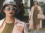141686, EXCLUSIVE: Kat Graham seen making her way through LAX wearing a camouflage hat. Los Angeles, California - Saturday August 29, 2015. Photograph: © PacificCoastNews. Los Angeles Office: +1 310.822.0419 sales@pacificcoastnews.com FEE MUST BE AGREED PRIOR TO USAGE