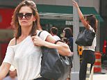 EXCLUSIVE: Katie Holmes carries her oversized bag while hailing a cab on Fifth Avenue in New York City.\n\nPictured: Katie Holmes\nRef: SPL1111982  300815   EXCLUSIVE\nPicture by: Splash News\n\nSplash News and Pictures\nLos Angeles: 310-821-2666\nNew York: 212-619-2666\nLondon: 870-934-2666\nphotodesk@splashnews.com\n