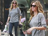 08/30/2015\nExclusive Gisele Bundchen walks up broadway in New York carrying flowers and walking with a friend. Magazines have been speculating that the worlds highest paid model and husband Tom Brady are having marital problems. The couple have not been spotted together in months. The super model has been spotted exactly once since her rumor of plastic surgery. \nsales@theimagedirect.com Please byline:TheImageDirect.com\n*EXCLUSIVE PLEASE EMAIL sales@theimagedirect.com FOR FEES BEFORE USE