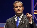 Josh Duggar speaks at the Family Leadership Summit in Ames, Iowa, in this file photo taken August 9, 2014.  Former reality TV star Duggar, who has admitted cheating on his wife following reports he was a subscriber to the hacked Ashley Madison affair website, has entered rehab, his family said on Wednesday.  REUTERS/Brian Frank/Files