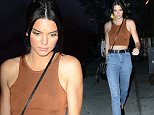 ***MANDATORY BYLINE TO READ INFPhoto.com ONLY***\nKendall Jenner enjoys some downtime before the rush of Mercedes-Benz Fashion Week hysteria next week and heads back to her downtown hotel in New York City.  The off-duty model keeps it causal in a brown crop top, high waisted jeans and black loafers.\n\nPictured: Kendall Jenner\nRef: SPL1117264  040915  \nPicture by: papjuice/INFphoto.com\n\n