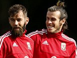 Bale and Joe Ledley share a joke as Wales train ahead of their qualifier in Nicosia on Thursday night