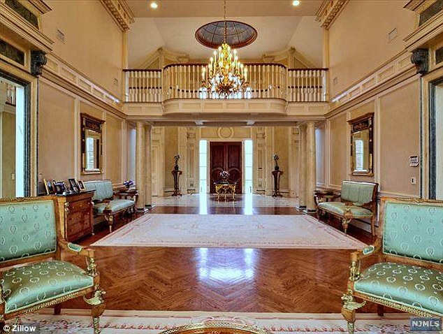 Fit for a king: The 21,000-square-foot, five-bedroom, nine-bath mansion is situated on two acres of land in tony Alpine, New Jersey