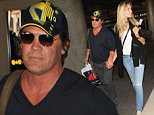 4 September 2015.\nJosh Brolin and Kathryn Boyd are seen at LAX.\nCredit: BG/GoffPhotos.com   Ref: KGC-300/150904NR9\n**UK, Spain, Italy, China, South Africa Sales Only**