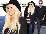 Los Angeles, CA - Jessica Simpson and husband Eric Johnson make their way past the paparazzi as they get set to fly out of town.  Jessica was full of smiles dressed in all black and holding Eric's hand.\nAKM-GSI       September  7, 2015\nTo License These Photos, Please Contact :\nSteve Ginsburg\n(310) 505-8447\n(323) 423-9397\nsteve@akmgsi.com\nsales@akmgsi.com\nor\nMaria Buda\n(917) 242-1505\nmbuda@akmgsi.com\nginsburgspalyinc@gmail.com
