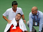 NEW YORK, NY - SEPTEMBER 03:  Jack Sock of the United States receives assistance from trainer Hugo Gravil for heat exhaustion as Ruben Bemelmans of Belgium talks with him during their Men's Singles Second Round match on Day Four of the 2015 US Open at the USTA Billie Jean King National Tennis Center on September 3, 2015 in the Flushing neighborhood of the Queens borough of New York City.  (Photo by Al Bello/Getty Images)