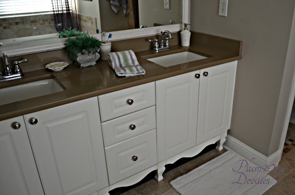 Give standard vanity furniture style with legs and skirt- PlumDoodles.com
