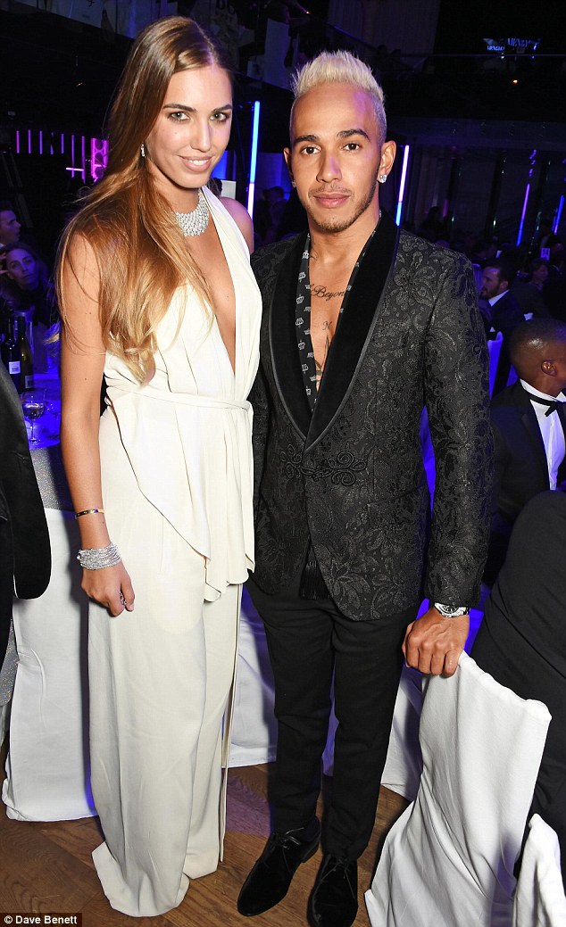 Stylish pair: Amber Le Bon and and Lewis Hamilton posed for pics in their style-savvy looks