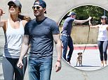 EXCLUSIVE: **PREMIUM EXCLUSIVE RATES APPLY** Chris Evans and Minka Kelly walk their dogs in West Hollywood. The couple fuelled rumours they are back together as they were spotted with their furry friends over Labor Day weekend, on September 5, 2015.\n\nPictured: Chris Evans and Minka Kelly\nRef: SPL1117194  080915   EXCLUSIVE\nPicture by: Splash News\n\nSplash News and Pictures\nLos Angeles: 310-821-2666\nNew York: 212-619-2666\nLondon: 870-934-2666\nphotodesk@splashnews.com\n