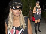 EXCLUSIVE: Rita Ora wears just a singlet top, knee high boots, a leather hat and carrying a 'Moschino' designer handbag as she arrives at a hotel in West Hollywood, CA

Pictured: Rita Ora
Ref: SPL1120359  100915   EXCLUSIVE
Picture by: SPW / Splash News

Splash News and Pictures
Los Angeles: 310-821-2666
New York: 212-619-2666
London: 870-934-2666
photodesk@splashnews.com