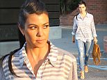 Kourtney Kardashian was spsotted visiting her local Calabasas Dentist for a check up.  The reality star went in a designer striped button-up and ripped jeans, on Wednesday, September 9, 2015 X17online.com