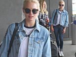 EXCLUSIVE: Margot Robbie spotted arriving to newark Airport today in New Jersey.....Pictured: Margot Robbie..Ref: SPL1120749  100915   EXCLUSIVE..Picture by: Lenny Abbot / Splash News....Splash News and Pictures..Los Angeles: 310-821-2666..New York: 212-619-2666..London: 870-934-2666..photodesk@splashnews.com..