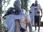 6.SEPT.2015 - BEVERLY HILLS - USA..**EXCLUSIVE ALL ROUND PICTURES**..CROONER SEAL SEEN HOLDING HANDS AND KISSING THE FOREHEAD OF HIS DELIRIOUSLY HAPPY GIRLFRIEND ERICA PACKER. THE HAPPY COUPLE LEFT A MANSION IN THE HILLS AFTER SOME LABOR DAY PARTYING WITH EX HEIDI KLUM. ERICA'S LOOSE MATERNAL STYLE DRESS NOTHING TO DISPEL RUMORS THAT SHE IS EXPECTING A CHILD WITH SEAL...BYLINE MUST READ: XPOSUREPHOTOS.COM..***UK CLIENTS - PICTURES CONTAINING CHILDREN PLEASE PIXELATE FACE PRIOR TO PUBLICATION ***..*UK CLIENTS MUST CALL PRIOR TO TV OR ONLINE USAGE PLEASE TELEPHONE 0208 344 2007*
