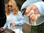 Picture Shows: Iggy Azalea  September 09, 2015\n \n Rapper Iggy Azalea visited Epione in Beverly Hills to get her hand tattoo removed.\n \n Non-Exclusive\n UK RIGHTS ONLY\n \n Pictures by : FameFlynet UK © 2015\n Tel : +44 (0)20 3551 5049\n Email : info@fameflynet.uk.com