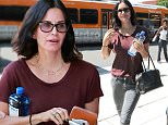 Friends star Courtney Cox wore a maroon shirt and gray jeans for lunch in Beverly Hills,  with friends, on Wednesday, September 9, 2015 X17online.com