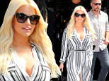 Jessica Simpson wears jail stripes inspired outfit when departing her hotel with Eric Johnson in NYC\n\nPictured: Jessica Simpson, ERic Johnson\nRef: SPL1123102  110915  \nPicture by: XactpiX/sPLash\n\nSplash News and Pictures\nLos Angeles: 310-821-2666\nNew York: 212-619-2666\nLondon: 870-934-2666\nphotodesk@splashnews.com\n