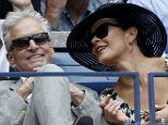 Actor Michael Douglas and his wife, actress Catherine Zeta Jones, attend the women's singles finals match between Roberta Vinci of Italy and compatriot Flavia Pennetta at the U.S. Open Championships tennis tournament in New York, September 12, 2015.   REUTERS/Mike Segar