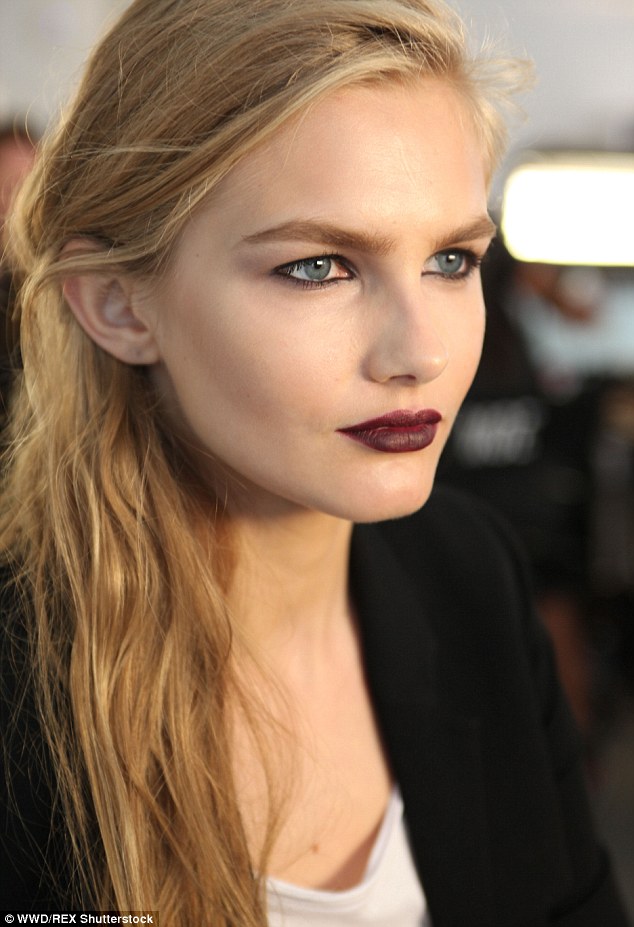 Berry tones: The models all wore a deep plummy matte lip to contrast the pale pastel designs