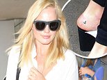 Picture Shows: Margot Robbie  September 12, 2015\n \n 'Wolf Of Wall Street' actress Margot Robbie arriving on a flight at LAX airport in Los Angeles, California. Margot was returning from New York where she attended the Cantor Fitzgerald's Charity Telethon last night. \n \n Non Exclusive\n UK RIGHTS ONLY\n \n Pictures by : FameFlynet UK © 2015\n Tel : +44 (0)20 3551 5049\n Email : info@fameflynet.uk.com