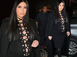 Kim Kardashian and Kanye West arrive at a private dinner at Carine Roitfeld's residence in NYC\n\nPictured: Kim Kardashian and Kanye West\nRef: SPL1126335  140915  \nPicture by: XactpiX/Splash\n\nSplash News and Pictures\nLos Angeles: 310-821-2666\nNew York: 212-619-2666\nLondon: 870-934-2666\nphotodesk@splashnews.com\n