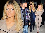 Kylie Jenner and sister, Khloe Kardashian Prove that Blondes have more fun as they joked around during a night out with Rapper Tyga. The sisters walked side by side after dinner at Il Mulino in NYC. Tyga joined them for the evening, but stayed behind.

Pictured: Kylie Jenner, Khloe Kardashian
Ref: SPL1125299  130915  
Picture by: 247PAPS.TV / Splash News

Splash News and Pictures
Los Angeles: 310-821-2666
New York: 212-619-2666
London: 870-934-2666
photodesk@splashnews.com