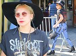 EXCLUSIVE: Lady Gaga shows her metal head side, sporting a Slipknot T shirt, as she steps out wearing a floppy hat and carrying a customized purse with a picture of Lady Gaga and her two dogs in New York City

Pictured: Lady Gaga
Ref: SPL1125876  140915   EXCLUSIVE
Picture by: Felipe Ramales / Splash News

Splash News and Pictures
Los Angeles: 310-821-2666
New York: 212-619-2666
London: 870-934-2666
photodesk@splashnews.com