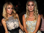 NEW YORK, NY - SEPTEMBER 15: Paris Hilton (L) and Nicky Hilton Rothschild attend Dennis Basso Front Row & Backstage Spring 2016 New York Fashion Week: The Shows at The Arc, Skylight at Moynihan Station on September 15, 2015 in New York City.  (Photo by Desiree Navarro/WireImage)