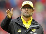 File photo dated 10-08-2014 of Borussia Dortmund manager Jurgen Klopp applauds the fans after the match PRESS ASSOCIATION Photo. Issue date: Friday April 17, 2015. Arsenal defender Per Mertesacker has tipped compatriot Jurgen Klopp to make his mark in the Barclays Premier League if he opts to continue his career in England. See PA story SOCCER Klopp. Photo credit should read Richard Sellers/PA Wire.