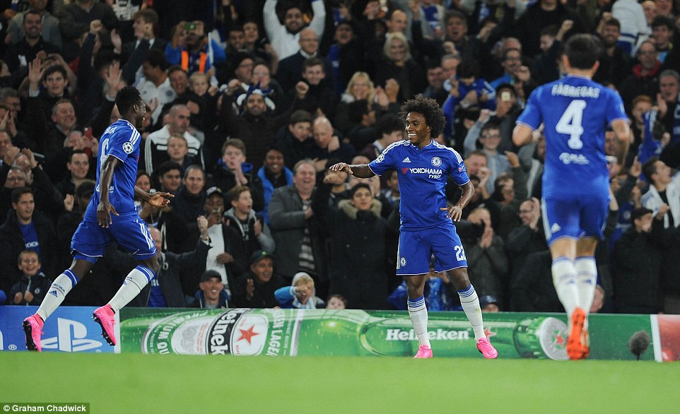 Dancing Willian is joined in his celebrations by his fellow Chelsea team-mates as he sends the Blues on their way to a routine victory