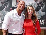 HOLLYWOOD, CA - MAY 19: Dwayne 'The Rock' Johnson and girlfriend, Lauren Hashian attend the hand/footprint ceremony honoring him held at TCL Chinese Theatre IMAX on May 19, 2015 in Hollywood, California.  (Photo by JB Lacroix/WireImage)