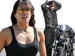 Malibu, CA - Actress, Michelle Rodriguez, oozed sex appeal as she was spotted leaving Tra Di Noi restaurant in full biker gear.  She was seen showing off her beautiful bike to some friends before she hoped on and rode off to PCH.\nAKM-GSI       September 18, 2015\nTo License These Photos, Please Contact :\nSteve Ginsburg\n(310) 505-8447\n(323) 423-9397\nsteve@akmgsi.com\nsales@akmgsi.com\nor\nMaria Buda\n(917) 242-1505\nmbuda@akmgsi.com\nginsburgspalyinc@gmail.com