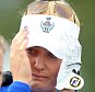 SANKT LEON-ROT, GERMANY - SEPTEMBER 20: Charley Hull of the European Team in tears on the 18th green where she is being comforted by Fanny Sunesson (l) and European Team vice captain Maria McBride (r) after Hull's match with Suzann Pettersen had ended acrimoniously after the European pair had won the 17th hole when the American rookie Alison Lee had inadavertantly picked up her ball before her putt had been conceded during the completion of the Saturday afternoon fourball matches in the 2015 Solheim Cup at St Leon-Rot Golf Club on September 20, 2015 in Sankt Leon-Rot, Germany.  (Photo by Thomas Niedermueller/Getty Images)