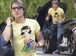 Picture Shows: Keith Urban  September 19, 2015\n \n Singer, Keith Urban, is spotted out and about in West Hollywood, California. New Idea magazine stated that he and his wife, Nicole Kidman are rumored to be expecting their third child.\n \n EXCLUSIVE ALL ROUNDER\n UK RIGHTS ONLY\n FameFlynet UK © 2015\n Tel : +44 (0)20 3551 5049\n Email : info@fameflynet.uk.com
