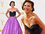 Maggie Gyllenhaal arrives at the 67th Primetime Emmy Awards on Sunday, Sept. 20, 2015, at the Microsoft Theater in Los Angeles. (Photo by Jordan Strauss/Invision/AP)