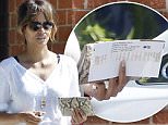 19.SEPT.2015 -   LOS ANGELES - USA\n** EXCLUSIVE ALL ROUND PICTURES **\nHOLLYWOOD ACTRESS HALLE BERRY AND HUSBAND OLIVIER MARTINEZ RETURN TO THEIR CAR TO FIND PARKING TICKET IN LSO ANGELES\nBYLINE MUST READ:  XPOSUREPHOTOS.COM\n**NOT AVAILABLE FOR GERMANY, AUSTRIA OR SWITZERLAND**\n***UK CLIENTS - PICTURES CONTAINING CHILDREN PLEASE PIXELATE FACE PRIOR TO PUBLICATION ***\n**UK AND USA CLIENTS MUST CALL PRIOR TO TV OR ONLINE USAGE PLEASE TELEPHONE 0208 344 2007*