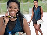 142700, Angela Simmons enjoys an afternoon on the beach in Miami. The 28 year old designer wore a blue snakeskin print one piece under a black see-through dress, and a pair of kitty sunglasses. After soaking up some rays, Angela hit the jet skis, taking one for a whirl about in the ocean. Miami, Florida - Sunday September 20, 2015. Photograph: Brett Kaffee/Thibault Monnier, ¬© Pacific Coast News. Los Angeles Office: +1 310.822.0419 sales@pacificcoastnews.com FEE MUST BE AGREED PRIOR TO USAGE