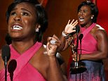 Uzo Aduba accepts the award for Outstanding Supporting Actress In A Drama Series for her role in Netflix's "Orange is the New Black" at the 67th Primetime Emmy Awards in Los Angeles, California September 20, 2015.  REUTERS/Lucy Nicholson