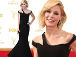IMAGE DISTRIBUTED FOR THE TELEVISION ACADEMY - Julie Bowen arrives at the 67th Primetime Emmy Awards on Sunday, Sept. 20, 2015, at the Microsoft Theater in Los Angeles. (Photo by Danny Moloshok/Invision for the Television Academy/AP Images)