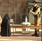 An Israeli soldier aims his rifle at a woman said to be 19-year-old Palestinian student Hadeel al-Hashlamun, before she was shot and killed by Israeli troops, at an Israeli checkpoint in the occupied West Bank city of Hebron September 22, 2015. The Israeli military said troops shot al-Hashlamun as she tried to stab a soldier. But relatives of al-Hashlamun denied the Israeli report saying she was executed. In a picture posted on Facebook, a soldier could be seen aiming his rifle at a woman said to be Hashlamun, standing a short distance away. She was completely covered in a black robe. REUTERS/Youth Against Settlements Group/Handout via Reuters?¢?Ç¨¬®?¢?Ç¨¬®ATTENTION EDITORS - THIS IMAGE HAS BEEN SUPPLIED BY A THIRD PARTY. IT IS DISTRIBUTED, EXACTLY AS RECEIVED BY REUTERS, AS A SERVICE TO CLIENTS. REUTERS IS UNABLE TO INDEPENDENTLY VERIFY THE AUTHENTICITY, CONTENT, LOCATION OR DATE OF THIS IMAGE. FOR EDITORIAL USE ONLY. NOT FOR SALE FOR MARKETING OR ADVERTISING CAMPAIGNS. NO SALES.