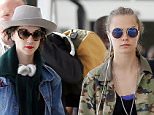 Picture Shows: Cara Delevingne, St. Vincent  September 20, 2015
 
 Cara Delevingne and her girlfriend St. Vincent arrive on a flight at Heathrow Airport in London, UK. The couple were seen hopping on motorbikes to make their way into central London.  Not before taking a selfie on their phones !!
 
 Exclusive All Round
 WORLDWIDE RIGHTS
 
 Pictures by : FameFlynet UK © 2015
 Tel : +44 (0)20 3551 5049
 Email : info@fameflynet.uk.com