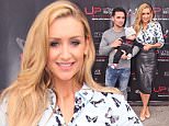 Catherine Tyldesley, her partner Tom Pitfield and their baby Alfie, at the opening of the Ultimate Performance Gym in Manchester, UK.

Pictured: Catherine Tyldesley, Tom Pitfield and baby alfie
Ref: SPL1132003  200915  
Picture by: DFL / Splash News

Splash News and Pictures
Los Angeles: 310-821-2666
New York: 212-619-2666
London: 870-934-2666
photodesk@splashnews.com