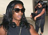 Picture Shows: Uzo Aduba  September 22, 2015\n \n 'Orange Is The New Black' actress Uzo Aduba is seen departing on a flight at LAX airport in Los Angeles, California. Uzo was carrying her Emmy Award in a black box as she made her way through the airport. \n \n Non Exclusive\n UK RIGHTS ONLY\n \n Pictures by : FameFlynet UK © 2015\n Tel : +44 (0)20 3551 5049\n Email : info@fameflynet.uk.com
