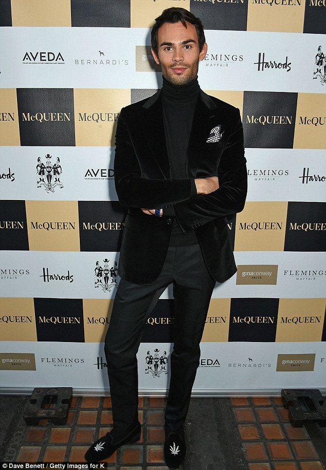 Dapper: Made In Chelsea's Mark Francis Vandelli, 26, looked very smart indeed in a black velvet blazer, a black roll-neck top, slim-fit black trousers and leaf-print shoes
