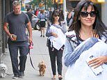 EXCLUSIVE TO INF.\nSeptember 23, 2015: Alec Baldwin and Hilaria Baldwin take baby Rafael Baldwin along as they get a morning coffee and walk their dogs in New York City.\nMandatory Credit: M. Nelson/INFphoto.com Ref: infusny-293