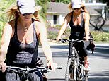 EXCLUSIVE TO INF.\nSeptember 23, 2015: Goldie Hawn seen biking around Brentwood without a helmet.\nMandatory Credit: Fresh/INFphoto.com Ref.: infusla-284