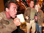 MUNICH, GERMANY - SEPTEMBER 24: Arnold Schwarzenegger and his partner Heather Milligan visit the Schuetzenfestzelt during the Oktoberfest 2015 at Theresienwiese on September 24, 2015 in Munich, Germany.  (Photo by Gisela Schober/Getty Images)