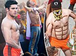Exclusive... 51858173 Actor Zac Efron shows off his best 'Magic Mike' moves while on the set of 'Neighbors 2' in Atlanta, Georgia on September 22, 2015. Zac jumped up on a table and stripped down and danced before revealing just a small pair of orange shorts. Zac then reached down the front of his shorts to help cover up his goods. Zac didn't let the smoke from BBQ grills disrupt his dance moves. FameFlynet, Inc - Beverly Hills, CA, USA - +1 (818) 307-4813