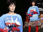 A model wears a creation for Moschino women's spring-summer 2016 collection, part of the Milan Fashion Week, unveiled in Milan, Italy, Thursday, Sept. 24, 2015. (AP Photo/Luca Bruno)